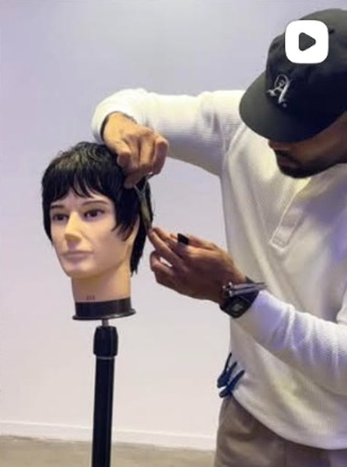 Flows by Dre styling hair in studio